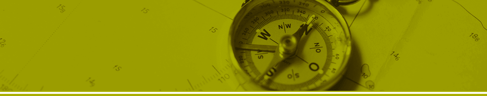 Compass on navigational chart at The History Museum, showcasing maritime navigation history and exploration artifacts.