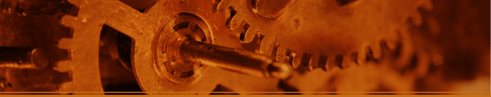 Rust-colored vintage gear mechanism showcasing intricate machinery details.
