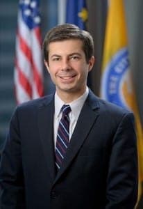 Portrait of a professional man in a suit at The History Museum, showcasing the museum's exhibits and historical artifacts.