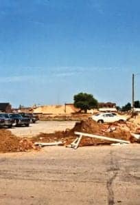 Construction site in downtown Northern Indiana with historic buildings in background.