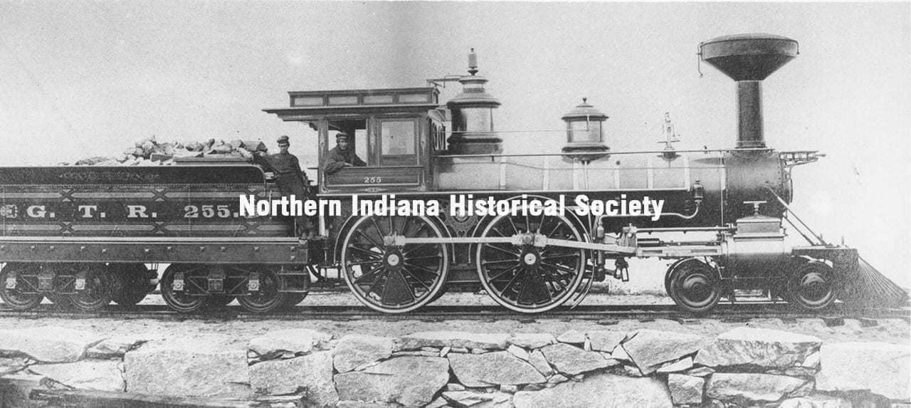 Old steam locomotive from the early 20th century at The History Museum, showcasing transportation history.