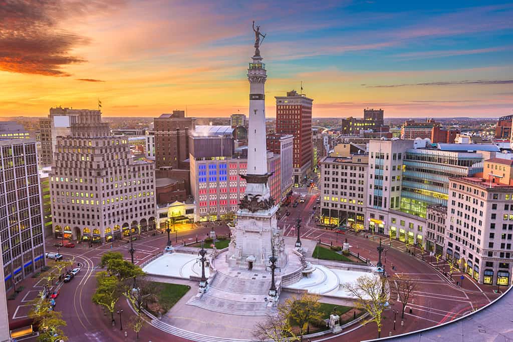 Indianapolis, Indiana, USA Cityscape and Monument Boston, Massachusetts, cityscape at sunset featuring Boston Common and the Boston Memorial. Historic architecture and urban skyline highlight the rich history and vibrant culture of Boston with the Boston State House and key landmarks.