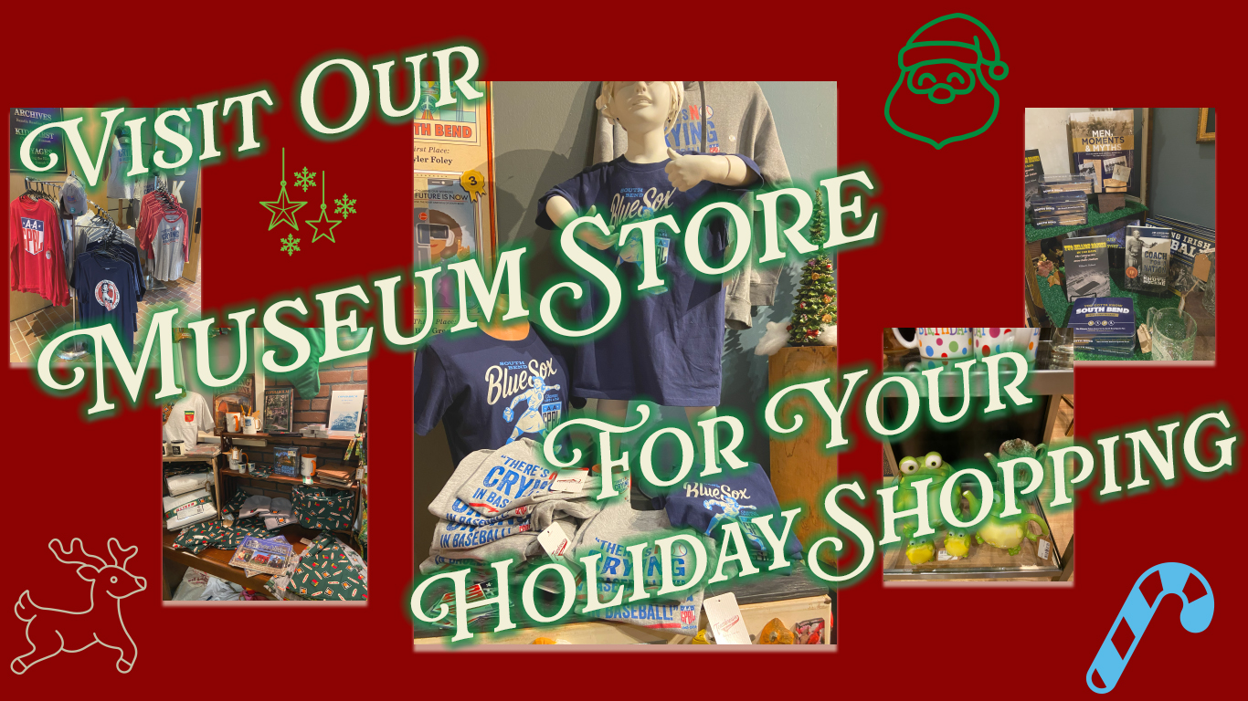 Blue Sox Museum Store holiday merchandise including apparel, accessories, and collectibles with a festive Christmas backdrop.