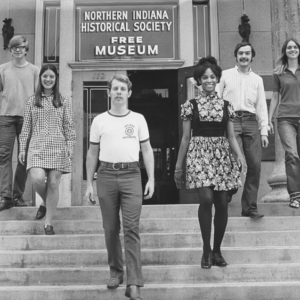1. Northern Indiana Historical Society museum entrance with diverse group of young people, featuring historical exhibits and educational programs in Indiana.